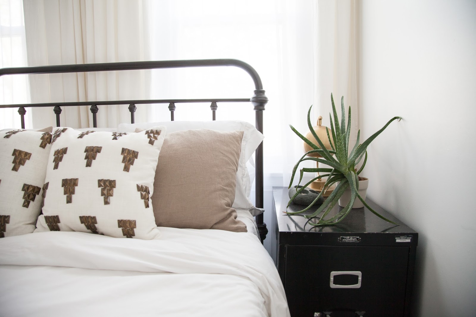 Renovated Guest Room with Filing Cabinet Side Table