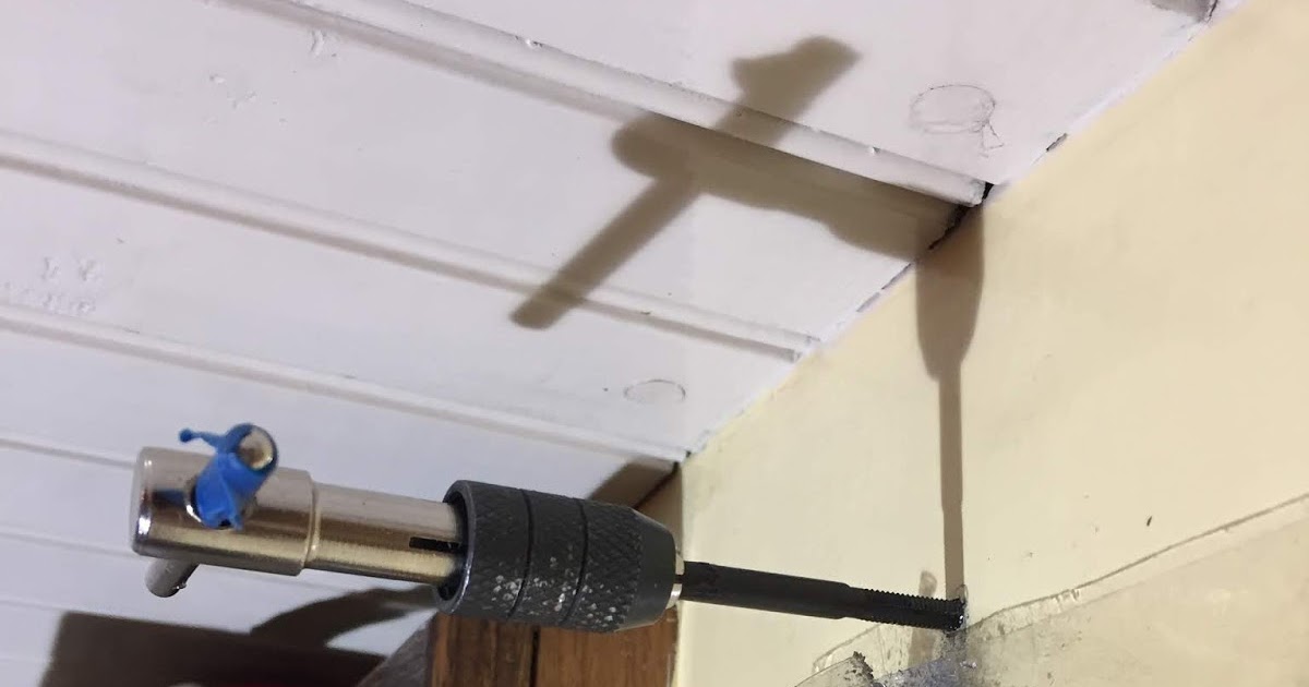 Percy Drilling holes in the boat