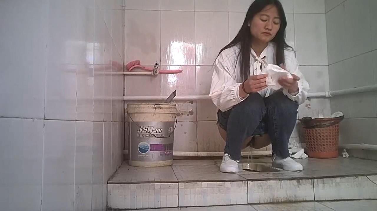 Chinese girls pooping and urinate in toilet.