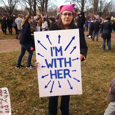 "I'm with Her" sign with arrows everywhere for the Women's March in Boston