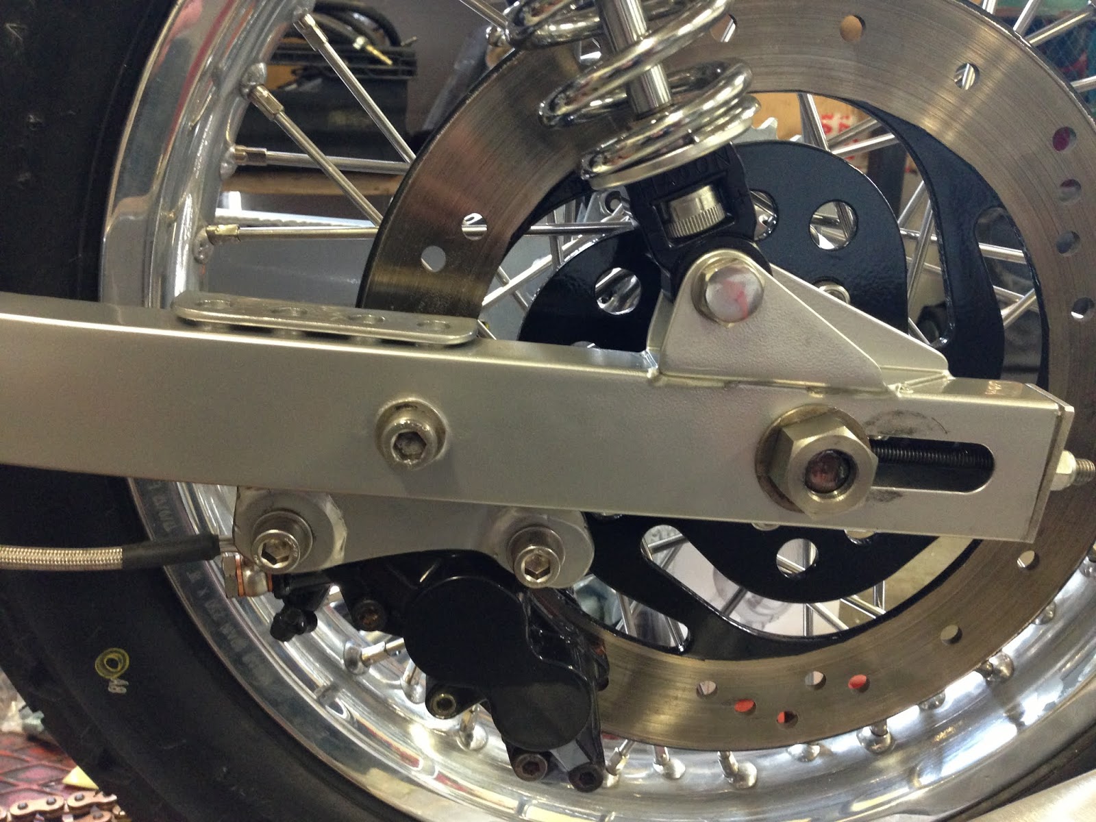 What is a swingarm A brief comparison of singlesided and doublesided