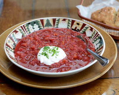 Karelian Borscht (FInnish-Russian Beet Borscht Soup) ♥ KitchenParade.com, extra hearty with sausage and a swirl of sour cream but also especially earthy and delicious as a vegetarian borscht.