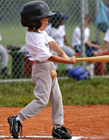 baseball hits kid in the balls