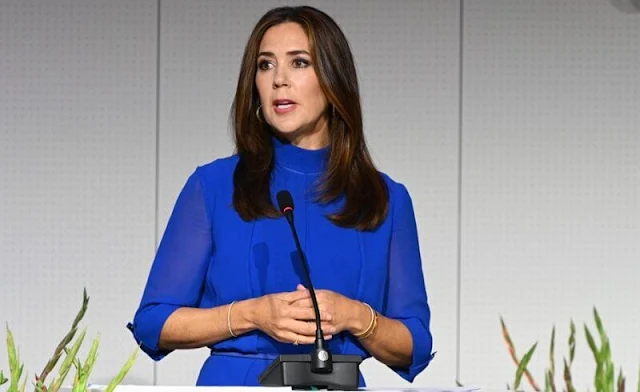 Crown Princess Mary wore a blue jumpsuit by YDE Copenhagen of Spring Summer 2016 collection. Cartier love gold diamond bracelet