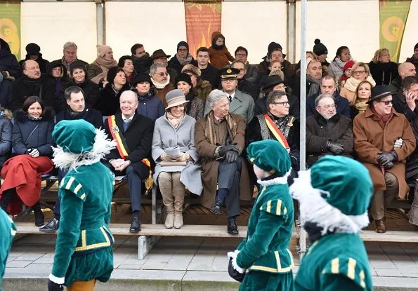 Queen Mathilde and King Philippe attended the Krakelingen Festival held in Geraardsbergen. Queen Mathilde wore Natan coat and Natan boots