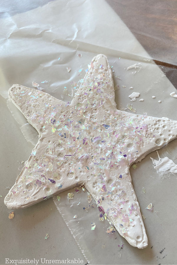 Clay Glitter Star on a table