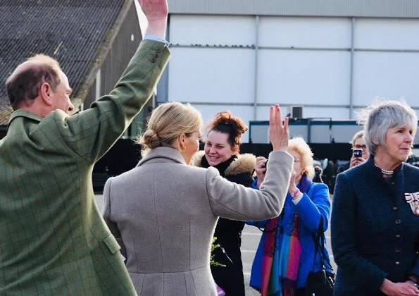 The Countess wore Suzannah Brodie wool long coat, Chloe peach blouse and lilac-coloured trousers, Hermes necklace