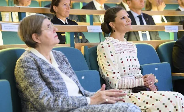 Crown Princess Victoria wore a comfy maisy dress from By Malina. Caroline Svedbom burgundy drop earrings. Rizzo Azelia pumps