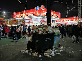 overflowing trash bin at the Victoria Park Lunar New Year Fair