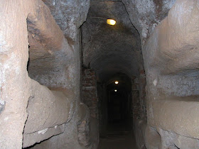 Inside one of the long passageways in the Catacomb of Callixtus on the Appian Way, where Julius I was first buried