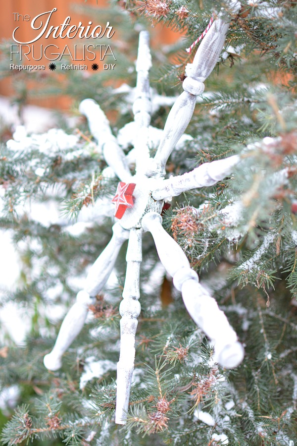 How to make a large wooden snowflake ornament to hang indoors or outdoors for Christmas or Winter decorating made with old repurposed chair spindles.