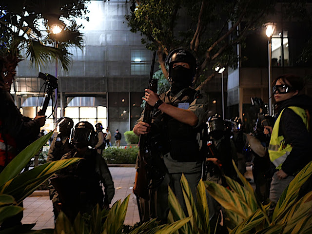 policeman holding a gun