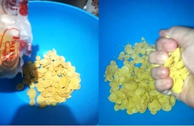 crush-the-chicken-flakes-in-fist