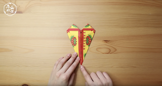 喪禮往生鞋子基本摺法:另一邊也對稱折好