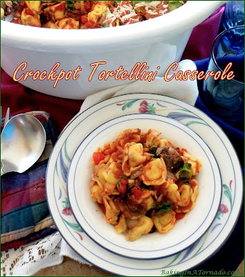 Crockpot Tortellini Casserole is a quick to assemble versatile meal. Frozen tortellini are layered with vegetables and sauce. Choose meatless or add meat, this casserole can also be baked in the oven. | Recipe developed by www.BakingInATornado.com | #recipe #dinner