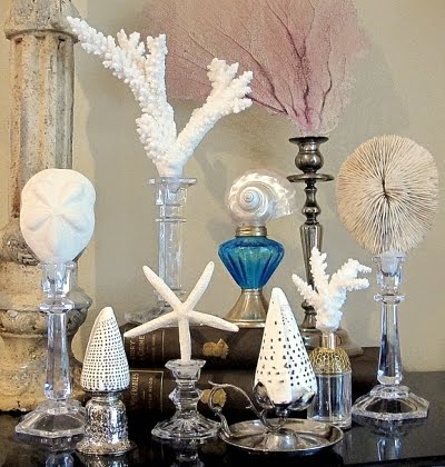 candle holders as display stands for shells