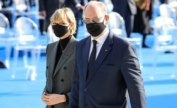 Princess Charlene of Monaco wore a double-breasted grey pinstripe jacket/blazer suit from MaxMara, Ralph Lauren, Akris and Brunello Cucinelli