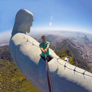 Reckless check-in on top of Christ the Redeemer statue