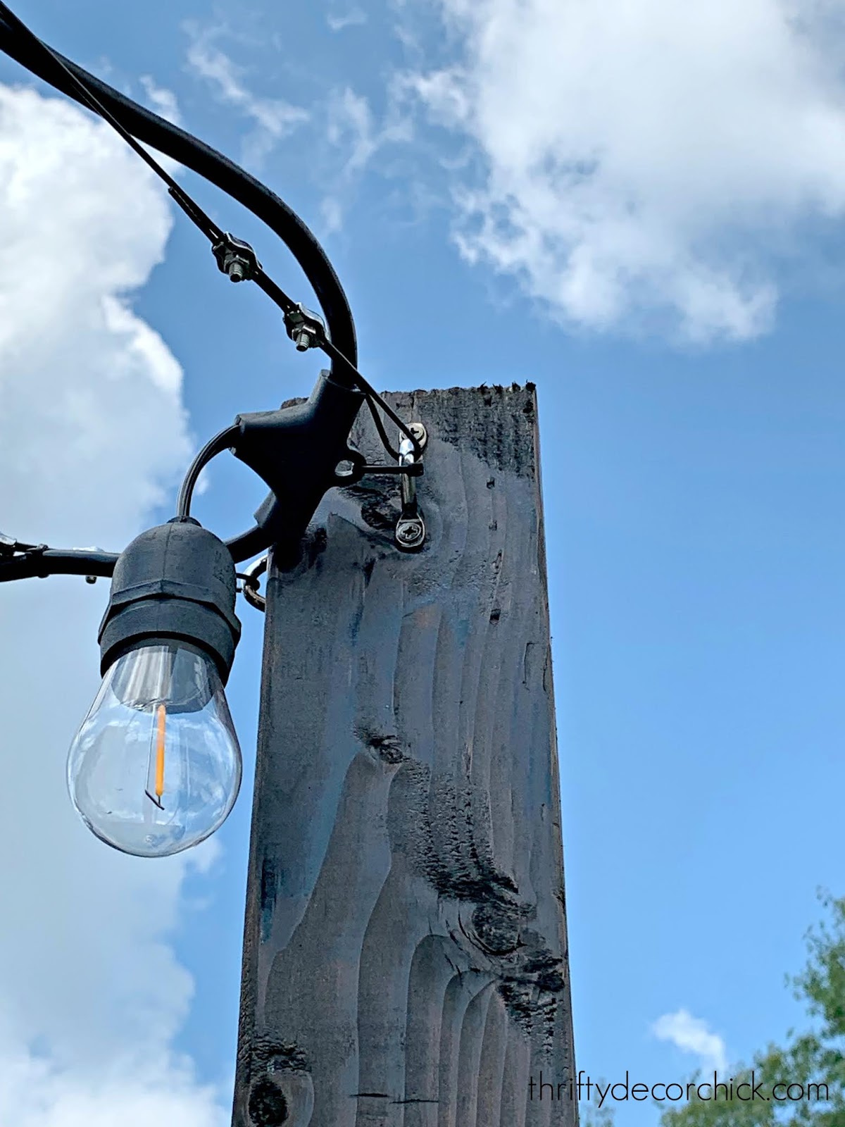 How to hang outdoor lights without trees