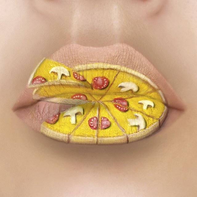 The work of Tutushka, depicting pizza on the lips with mushrooms and tomatoes