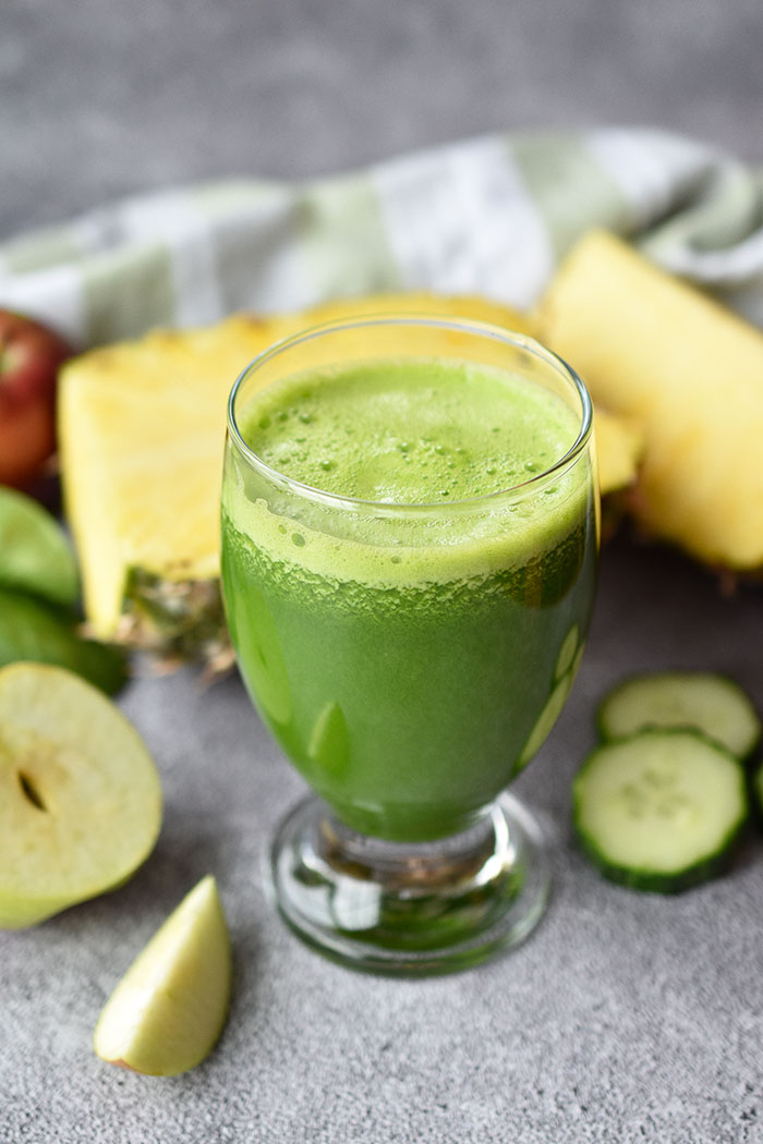 Woman in Real Life Pineapple Spinach Green Juice