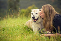 Portrait of Mia Cobb with her dog