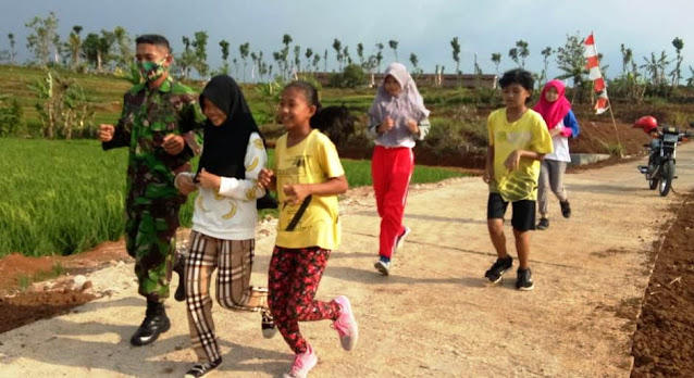Asyiknya Lari-Lari Di Jalan Bakti Juang TMMD Reg 109 Karanganyar