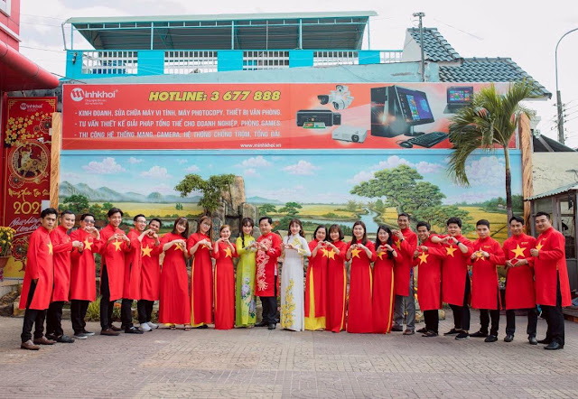 Áo dài cờ đỏ sao vàng đồng phục quận Tân Phú