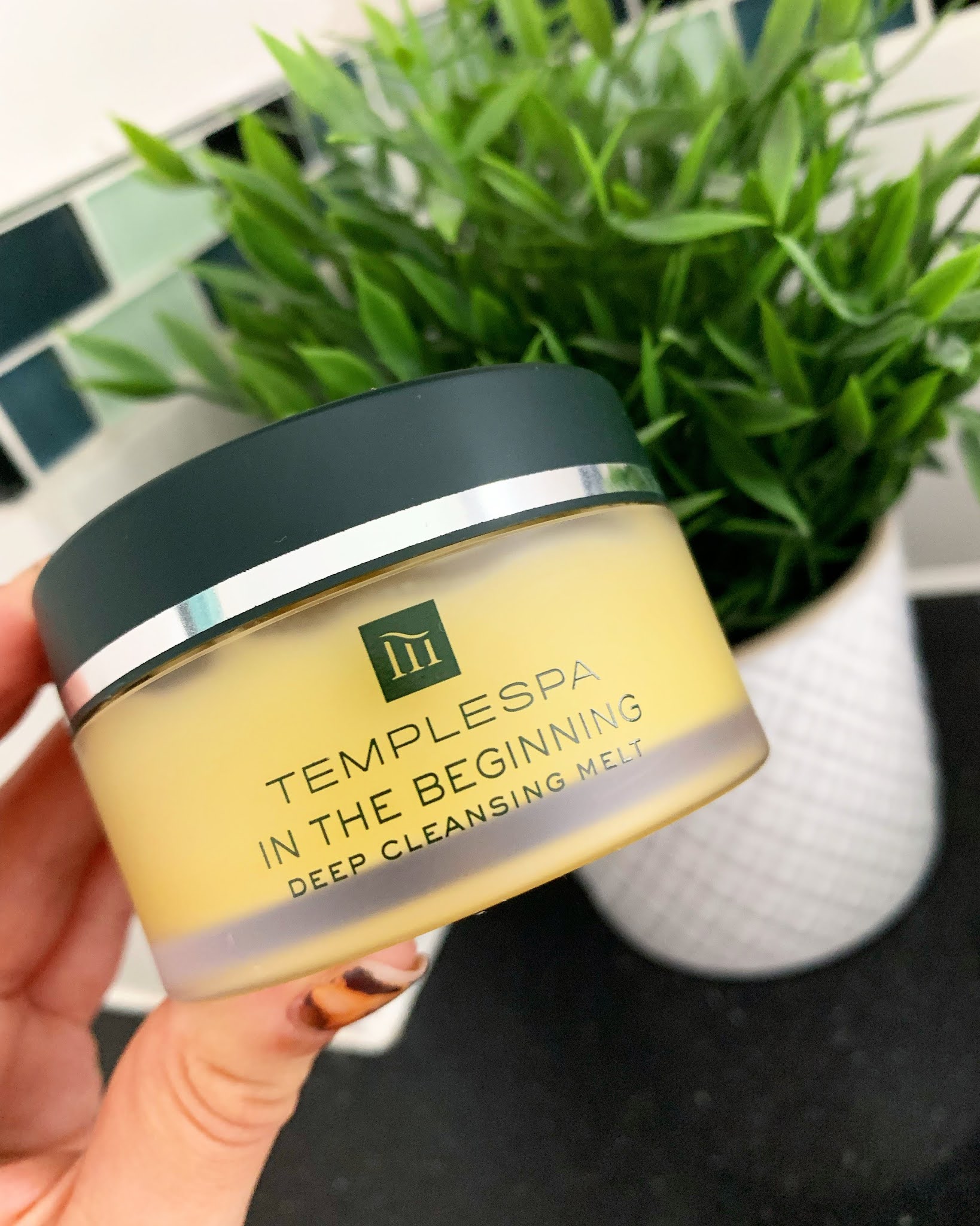 Temple Spa In The Beginning Deep Pore Cleansing Balm Temple Spa In The Beginning Deep Pore Cleansing Balm being held