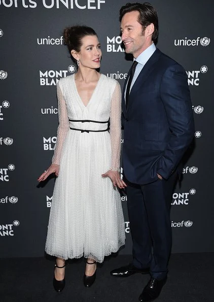 Charlotte Casiraghi of Monaco wore a white Giambattista Valli Long Sleeve V-Neck dress for Montblanc and Unıcef Gala Dinner