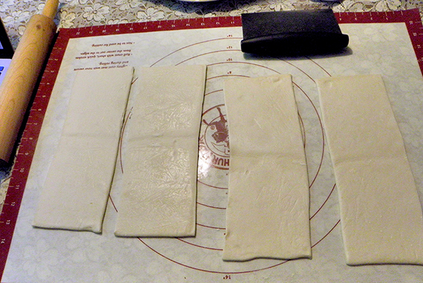 4 Dough Rectangles Being Rolled out