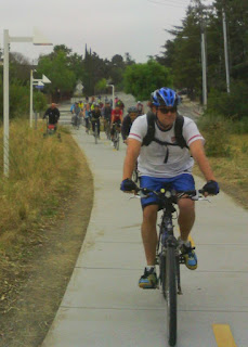 Riders climbing up to the suspension bridge over Interstate 280, Cupertino, California.