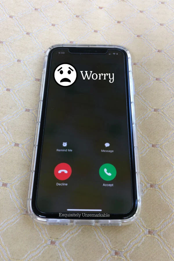 Cell phone on table and worry is calling