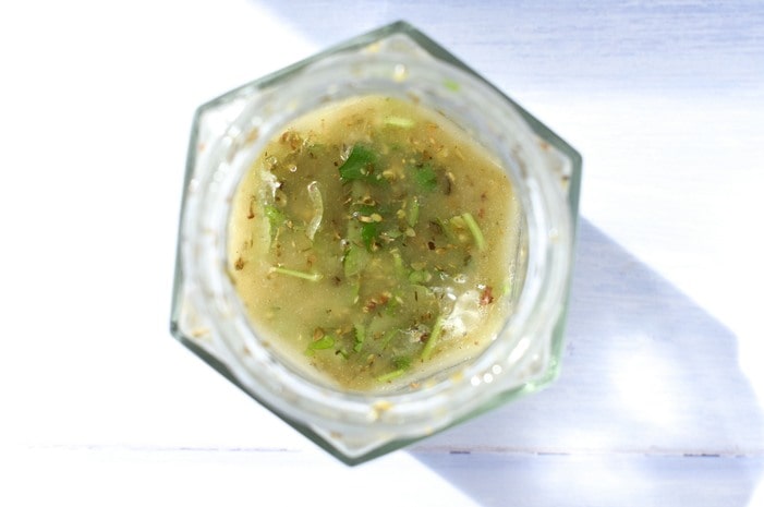 Overhead shot of salad dressing in a glass jar