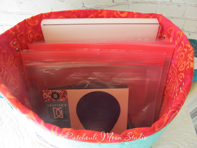 Patchouli Moon Studio~ Fabric Container to Hold Crafter's Edge Die Cuts & Plates Inside look at fabric container holding plastic bags of cutting dies