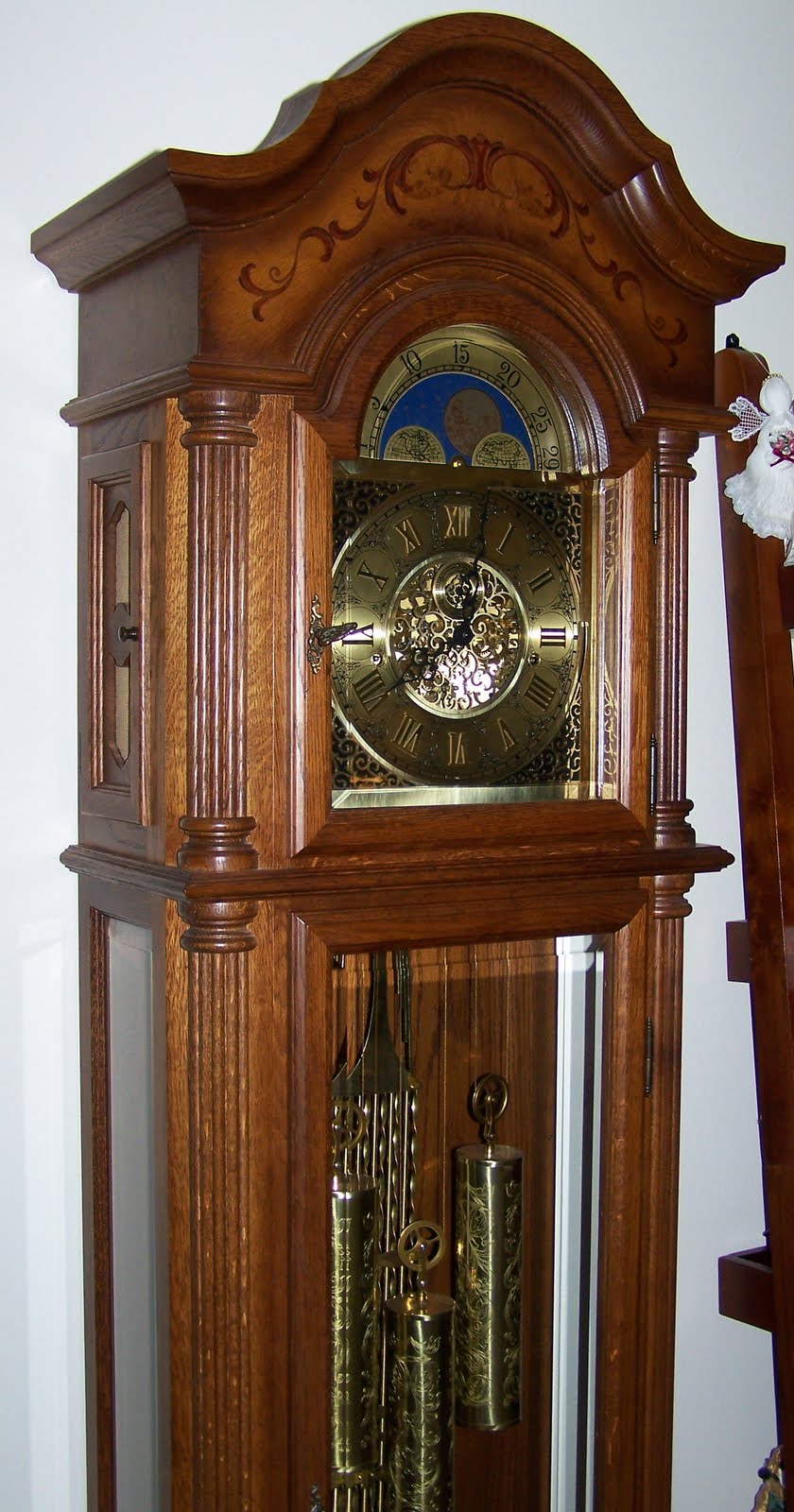 A View from Behind the Curtain Grandfather Clocks.
