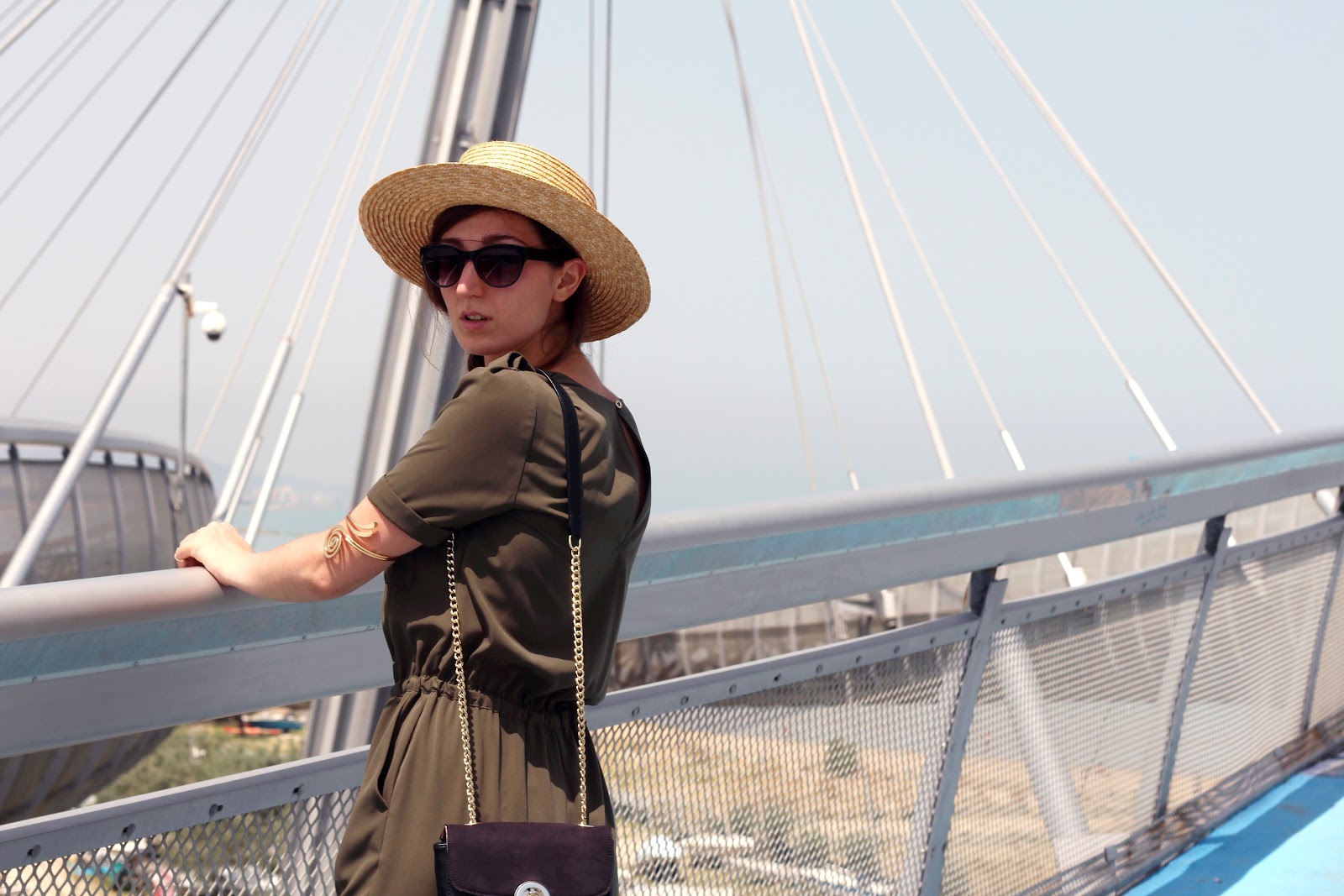 ashion style blogger outfit ootd italian girl italy trend vogue glamour pescara ponte del mare ovs ovspeople jumpsuit military green straw hat cappello paglia hm estate tutina ballerine stringate lacci lace up ballet shoes flats zara bag borsa tracolla ring middle finger