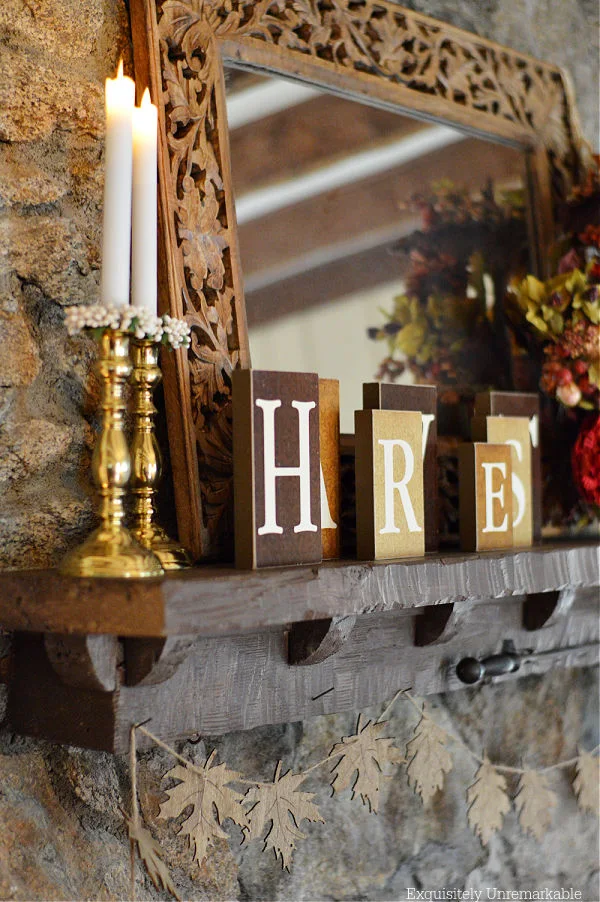 Stone Fireplace Mantel For Fall With Leaf Banner and Candles