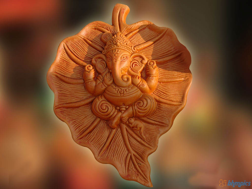 Beautiful Lord Ganesha On Leaf:wallpapers screensavers