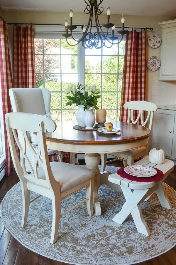 Red Buffalo Checked Curtain Panels in the kitchen near a round table