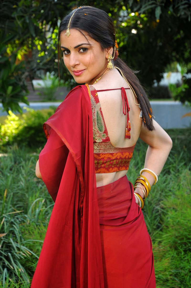 Actress Sharddha Arya Stills In Half Saree Cap