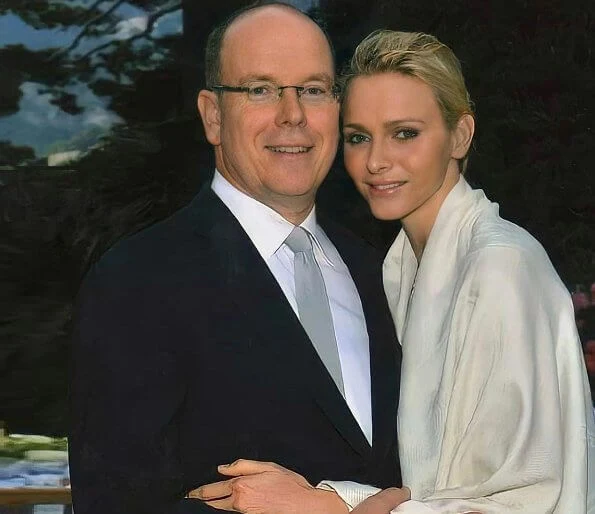 Princess Charlene, Prince Albert, Hereditary Prince Jacques and Princess Gabriella. Charlene wore a dress from Dior