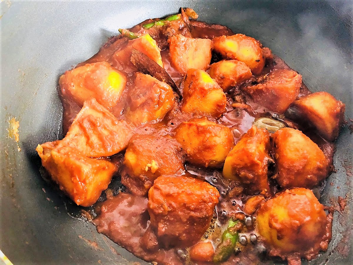 Dum Aloo ( Fried Potatoes tossed in spicy tomato gravy)
