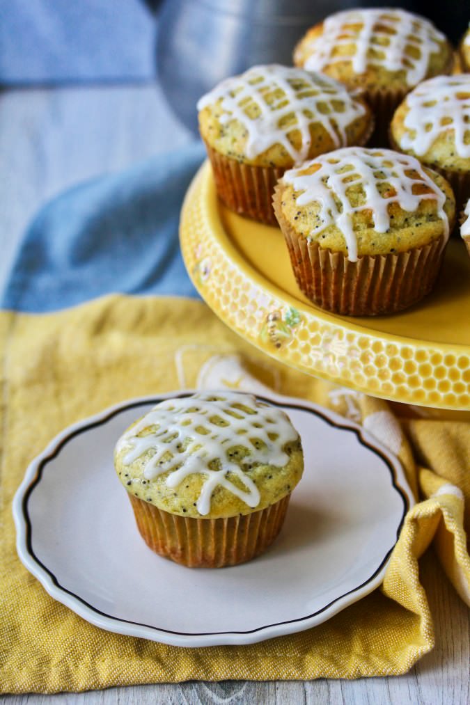 Lemon ricotta muffin with a sugar glaze on a plate