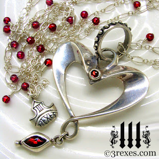 silver heart necklace with garnets 