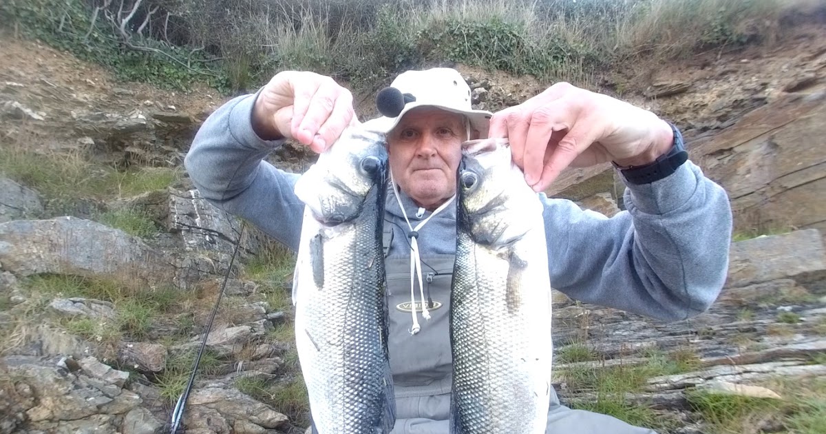 Cornish Shore and Kayak Fisherman Shore Lure Fishing for Bass Night