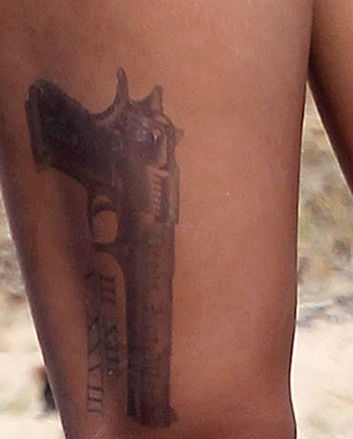rihanna gun tattoo on leg real rihanna gun tattoo on her leg rihanna ...