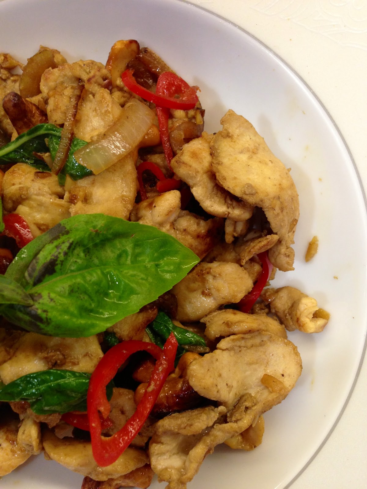 Stir Fry Chicken Slices with Cashew Nuts and Basil Leaves
