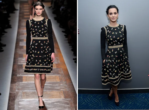 Dressed in a Valentino fall 2012, her long-sleeve dress with fitted bodice and flared skirt floral