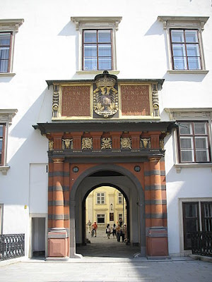 "Schweizertor Hofburg Vienna June 2006 545" by Gryffindor - Own work. Licensed under CC BY-SA 2.5 via Wikimedia Commons - https://commons.wikimedia.org/wiki/File:Schweizertor_Hofburg_Vienna_June_2006_545.jpg#/media/File:Schweizertor_Hofburg_Vienna_June_2006_545.jpg